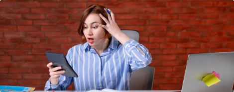 Frustrated woman with laptop